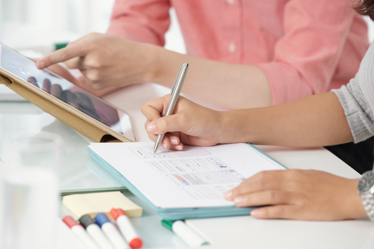 Clinician conducting a pre-admission assessment to determine the appropriate level of mental health care