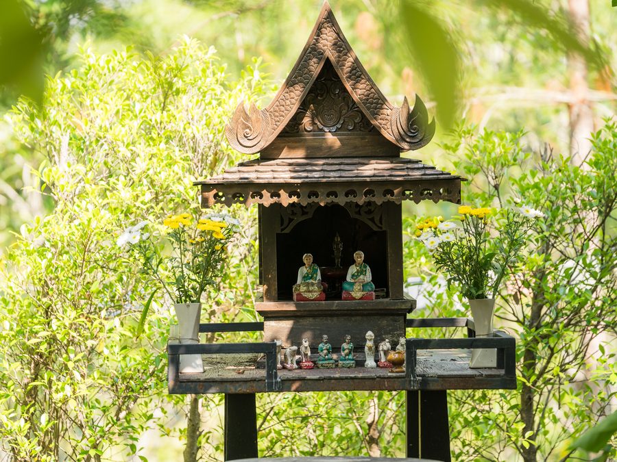 A spirit house standing in the grounds