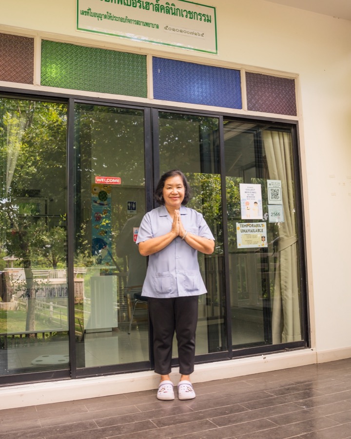A nurse at the door of the on-site medical clinic