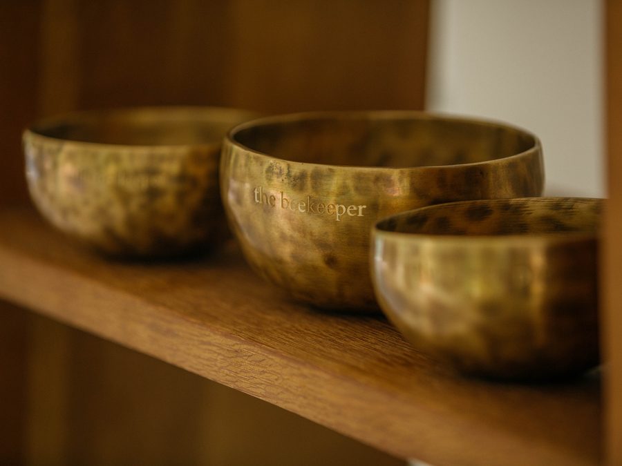 Singing bowls on a shelf in the sala